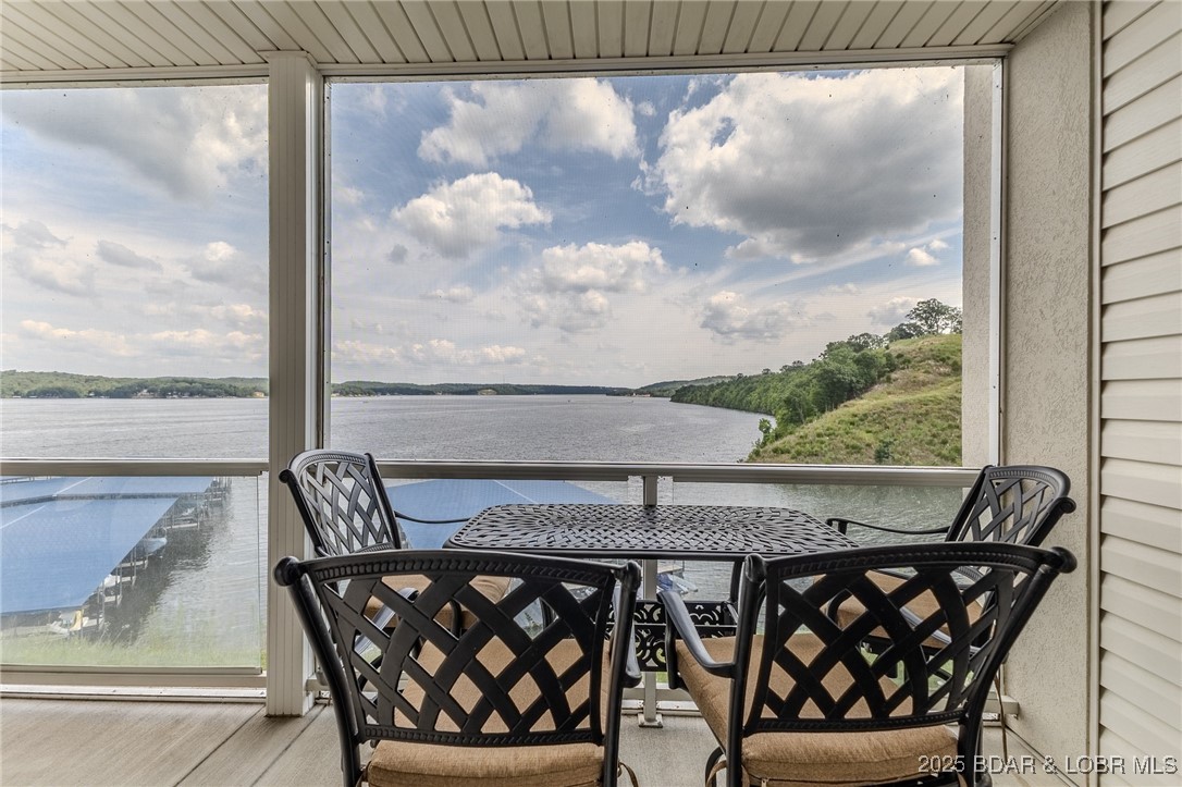 100 Trinity Pointe Drive, Unit 2L Camdenton, MO 65020 - Photo 3 of 43 Screened Deck facing Northeast
