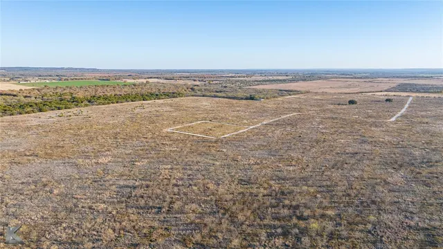 an aerial view of beach and ocean