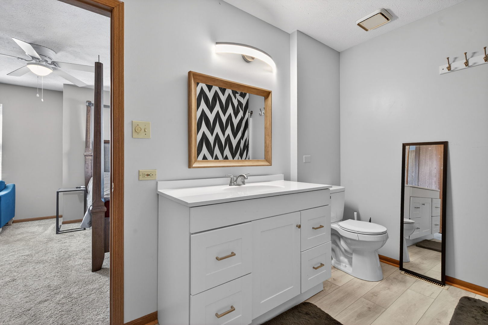 805 Addleman Street Joliet, IL 60431 - Photo 15 of 31 a bathroom with a toilet sink and mirror