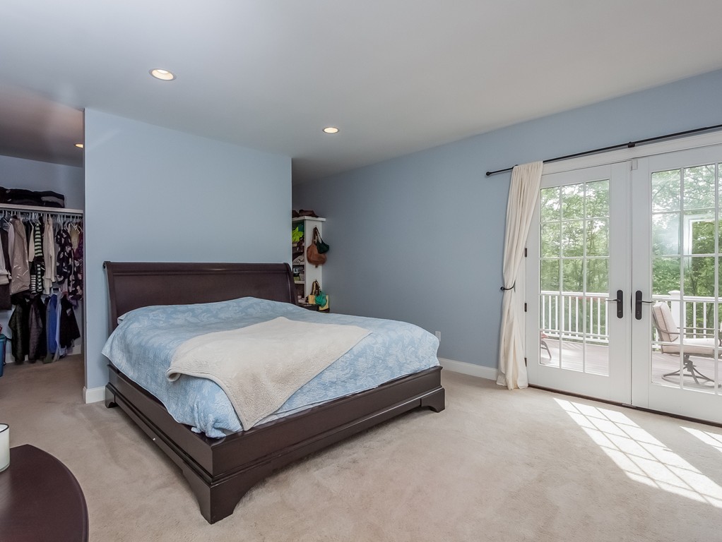 208 Southampton Road Holyoke, MA 01040 - Photo 16 of 30 a bed sitting in a spacious bedroom next to a window