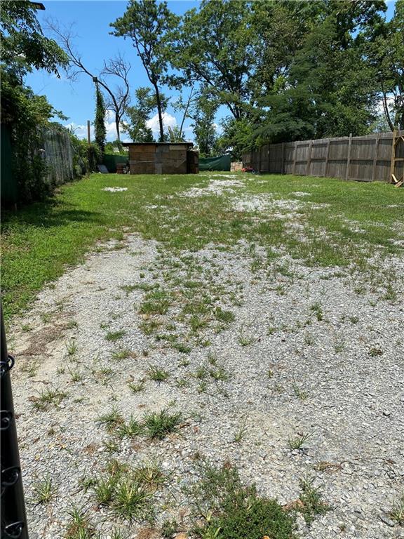1445 Willingham Drive Atlanta, GA 30344 - Photo 1 of 1 a backyard of a house with lots of green space