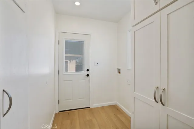 a view of small space with wooden floor