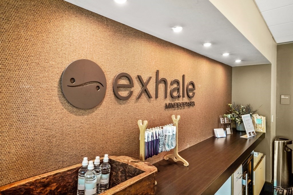 4 Battery Wharf, Unit 4305 Boston, MA 02109 - Photo 14 of 17 a room with furniture and air hockey table