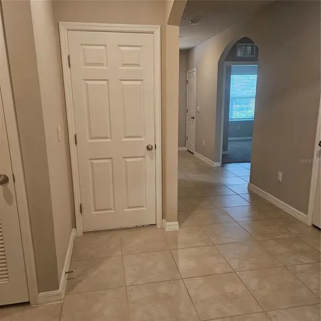 a view of a glass door and the window