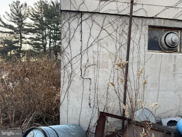 a view of a door and chair in a room