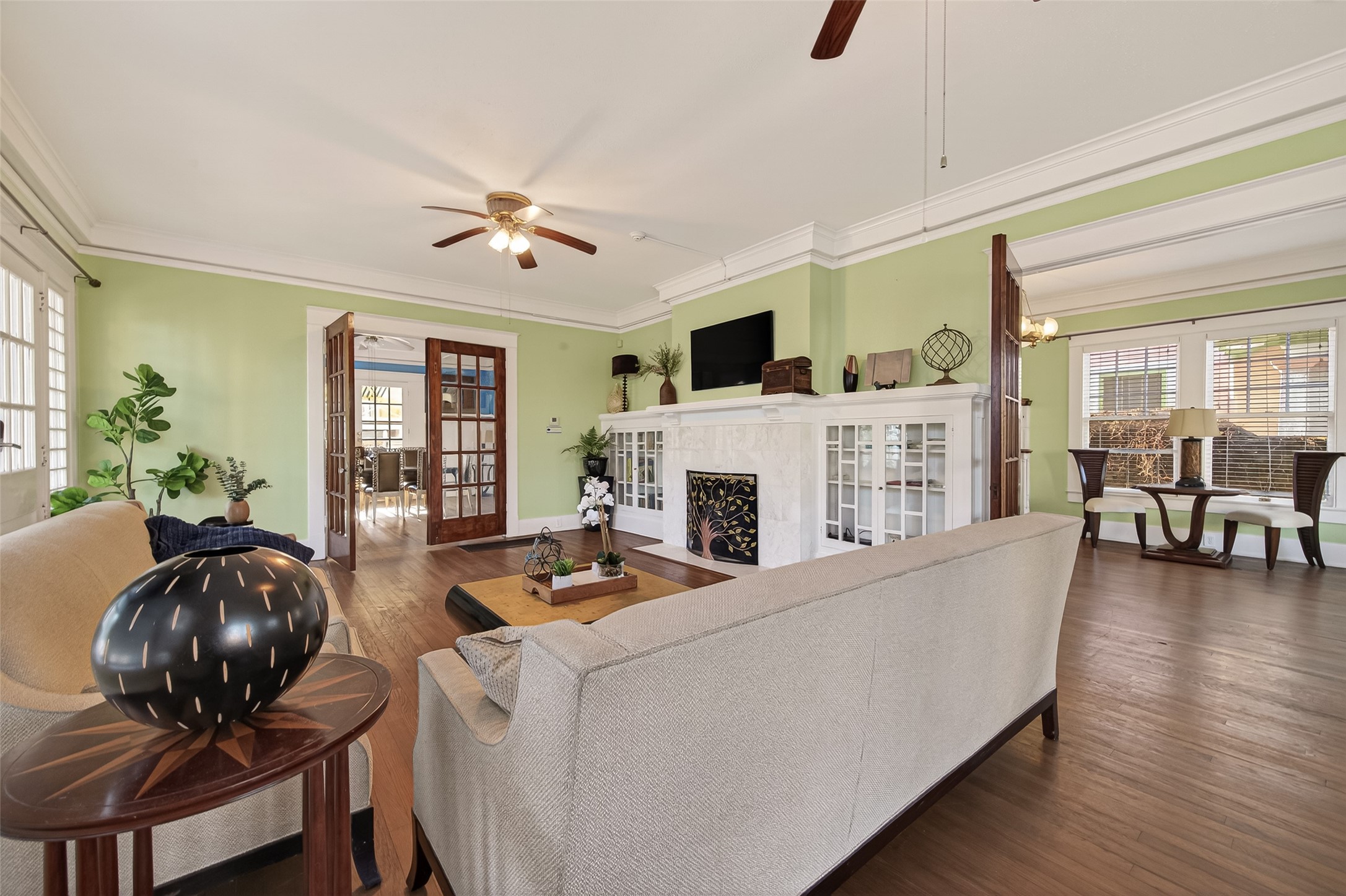 1723 Rosenberg Street Galveston, TX 77550 - Photo 12 of 38 Open-concept living area flowing into the dining area.