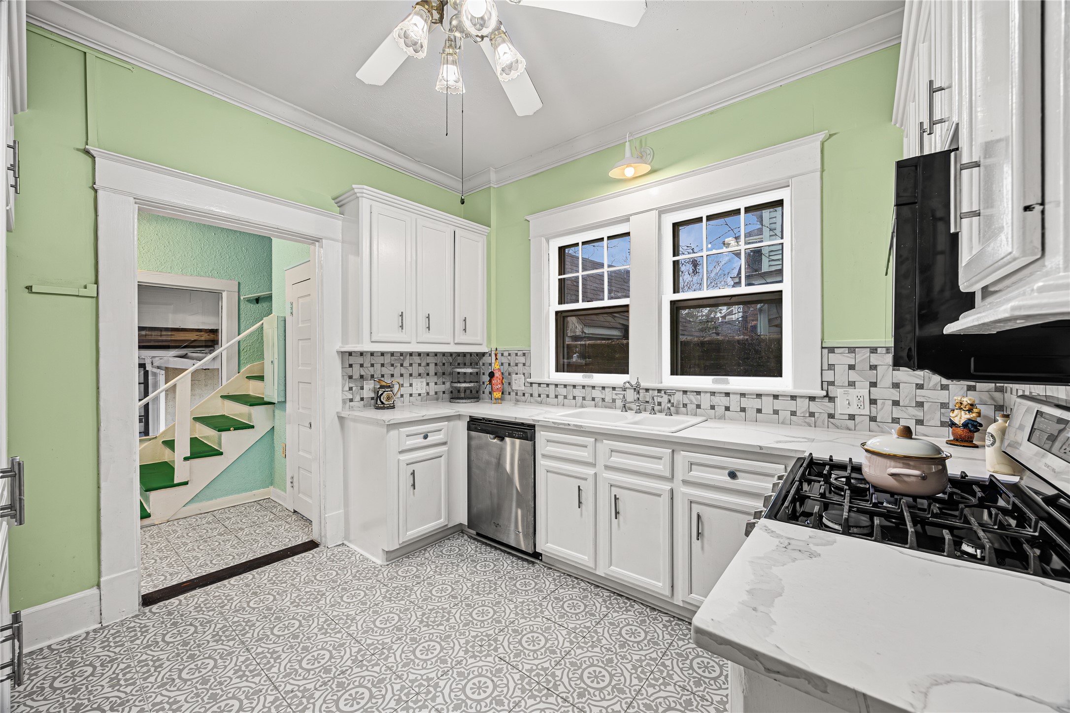 1723 Rosenberg Street Galveston, TX 77550 - Photo 15 of 38 Bright kitchen with ample cabinetry and counter space.