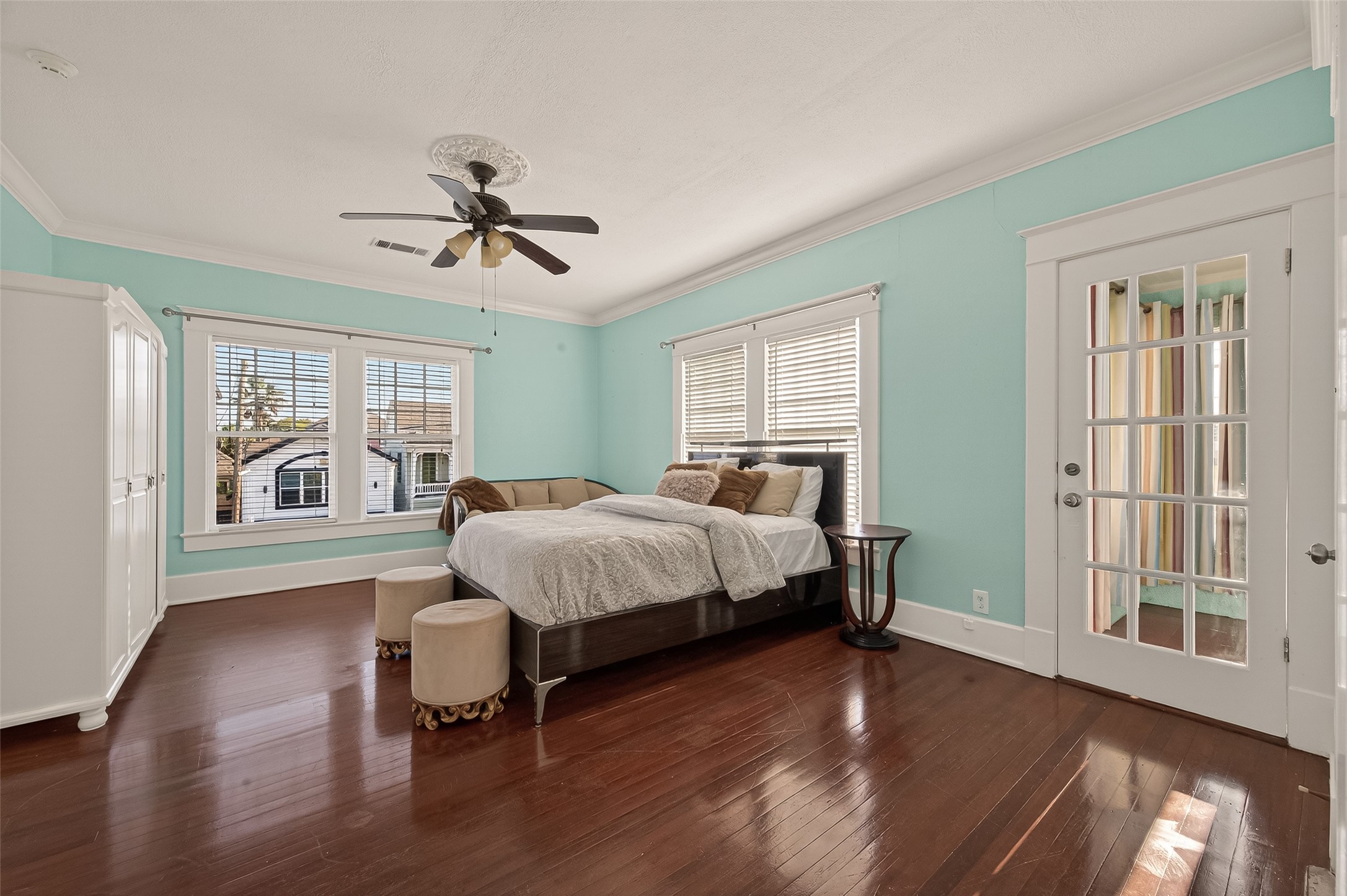 1723 Rosenberg Street Galveston, TX 77550 - Photo 20 of 38 Spacious bedroom with hardwood flooring and natural light.