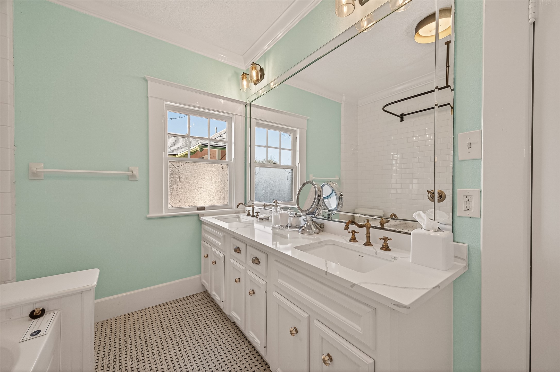 1723 Rosenberg Street Galveston, TX 77550 - Photo 21 of 38 Bathroom with double sinks and plenty of storage.