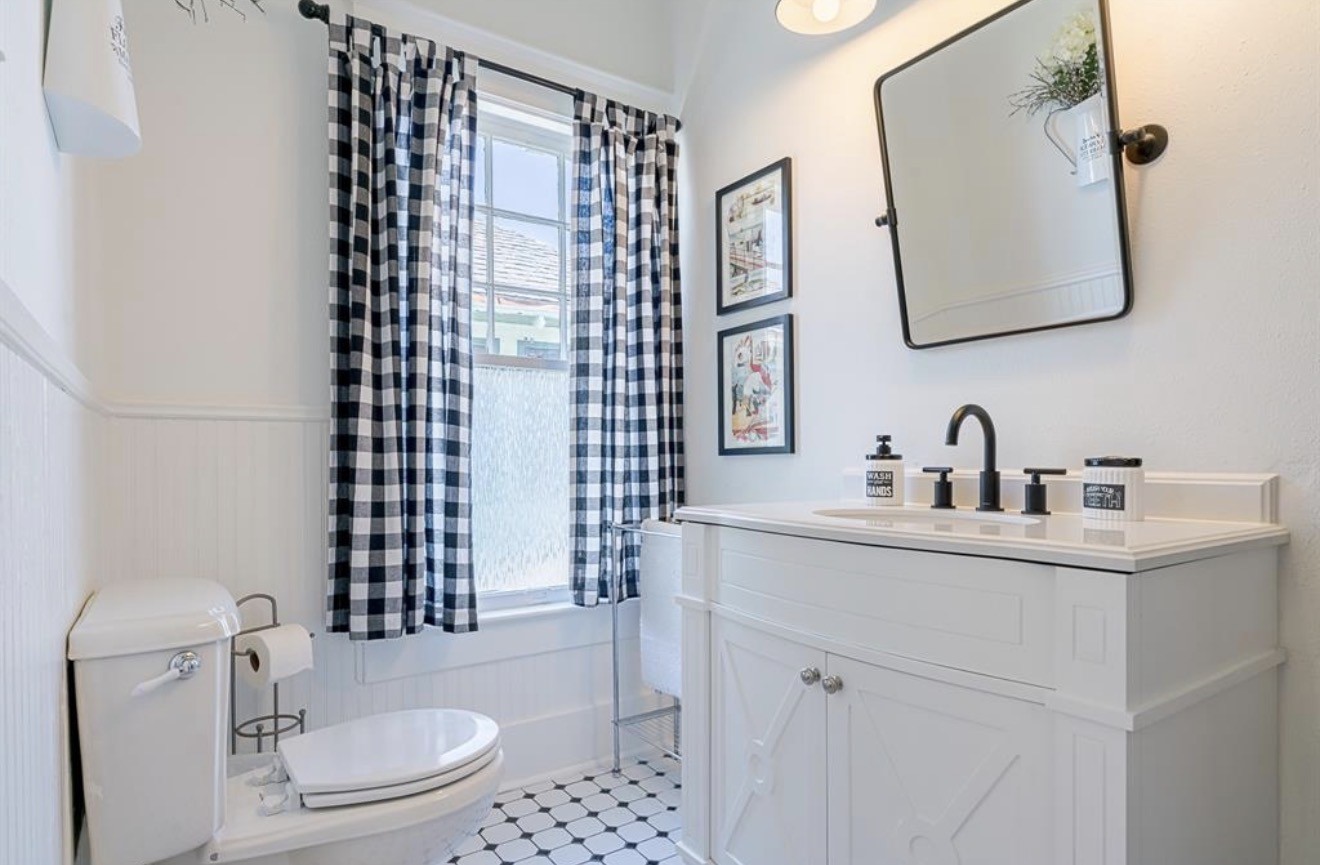 1723 Rosenberg Street Galveston, TX 77550 - Photo 24 of 38 Additional bathroom with modern fixtures and updated vanity.