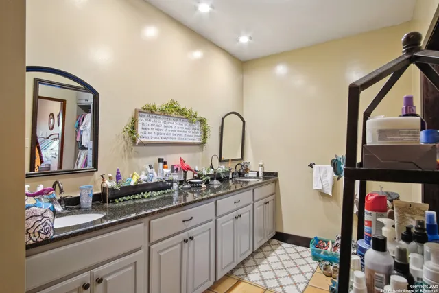 a bathroom with a bathtub and shower