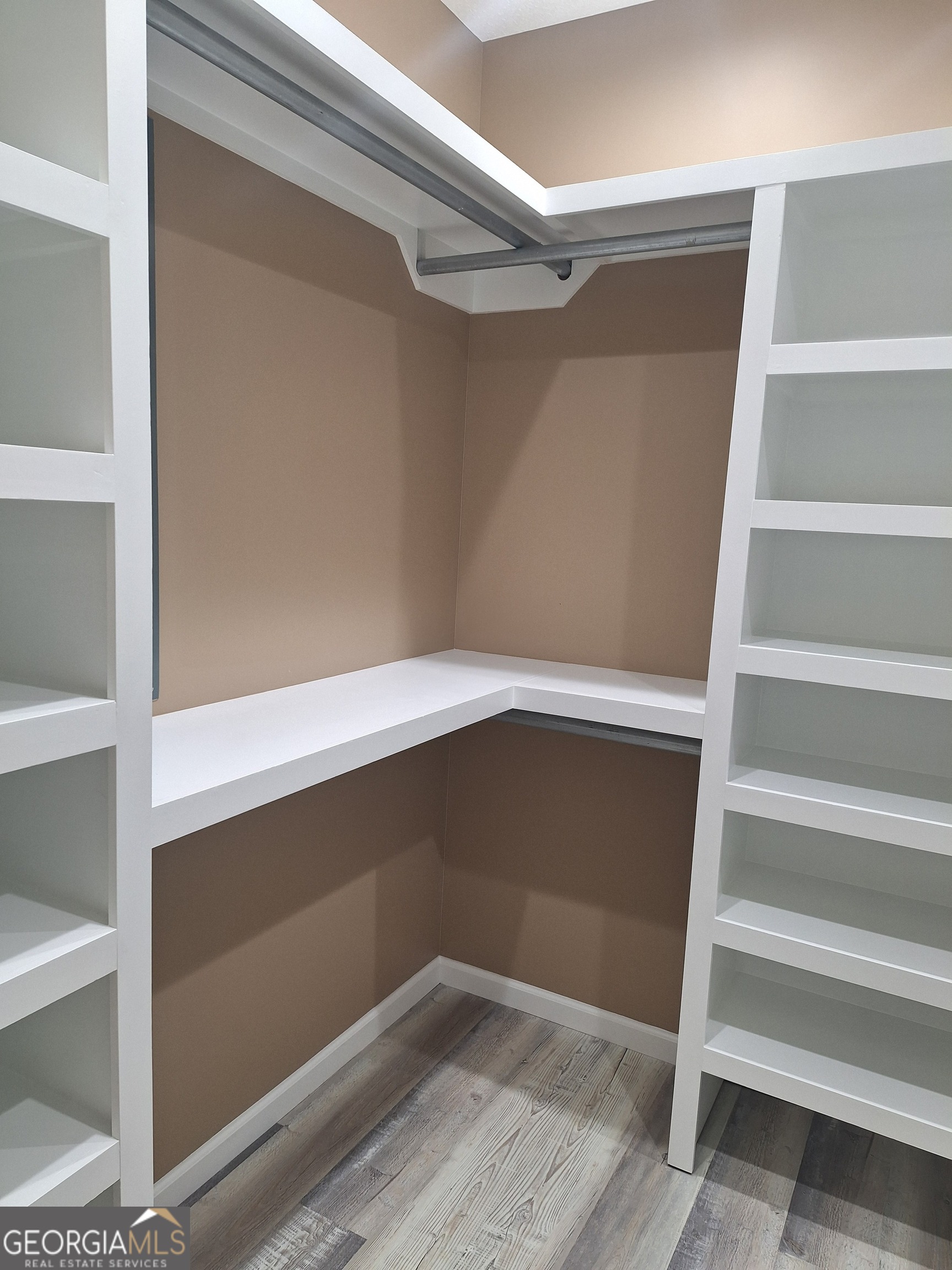 155 Peach Lane Baxley, GA 31513 - Photo 14 of 19 a view of an empty walk in closet