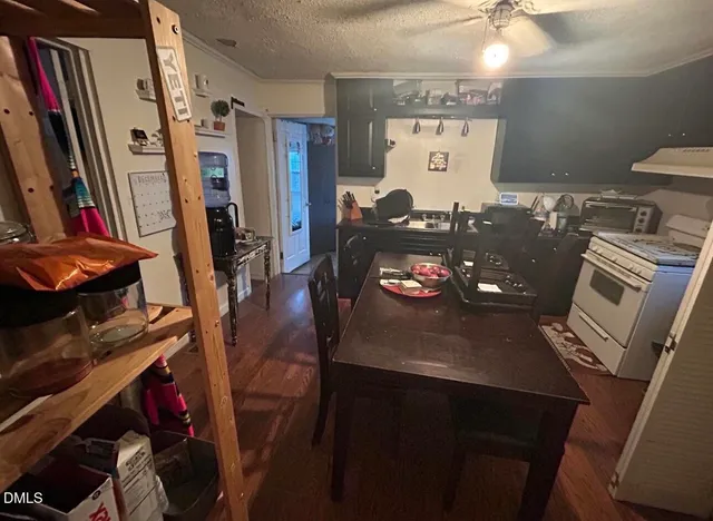 a view of a workspace with furniture