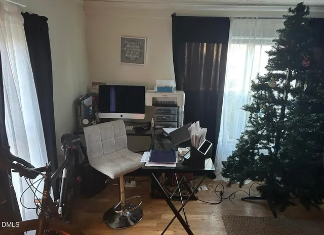 a view of a workspace with furniture