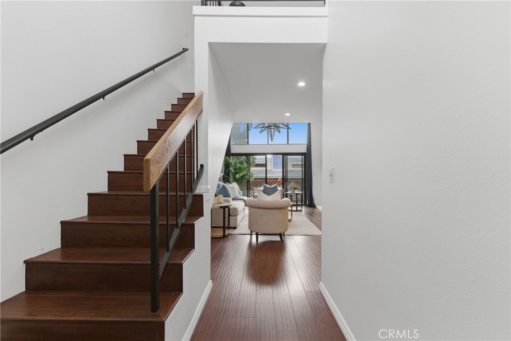 8180 Manitoba Street, Unit 330 Playa del Rey, CA 90293 - Photo 23 of 31 a view of entryway and hall with wooden floor