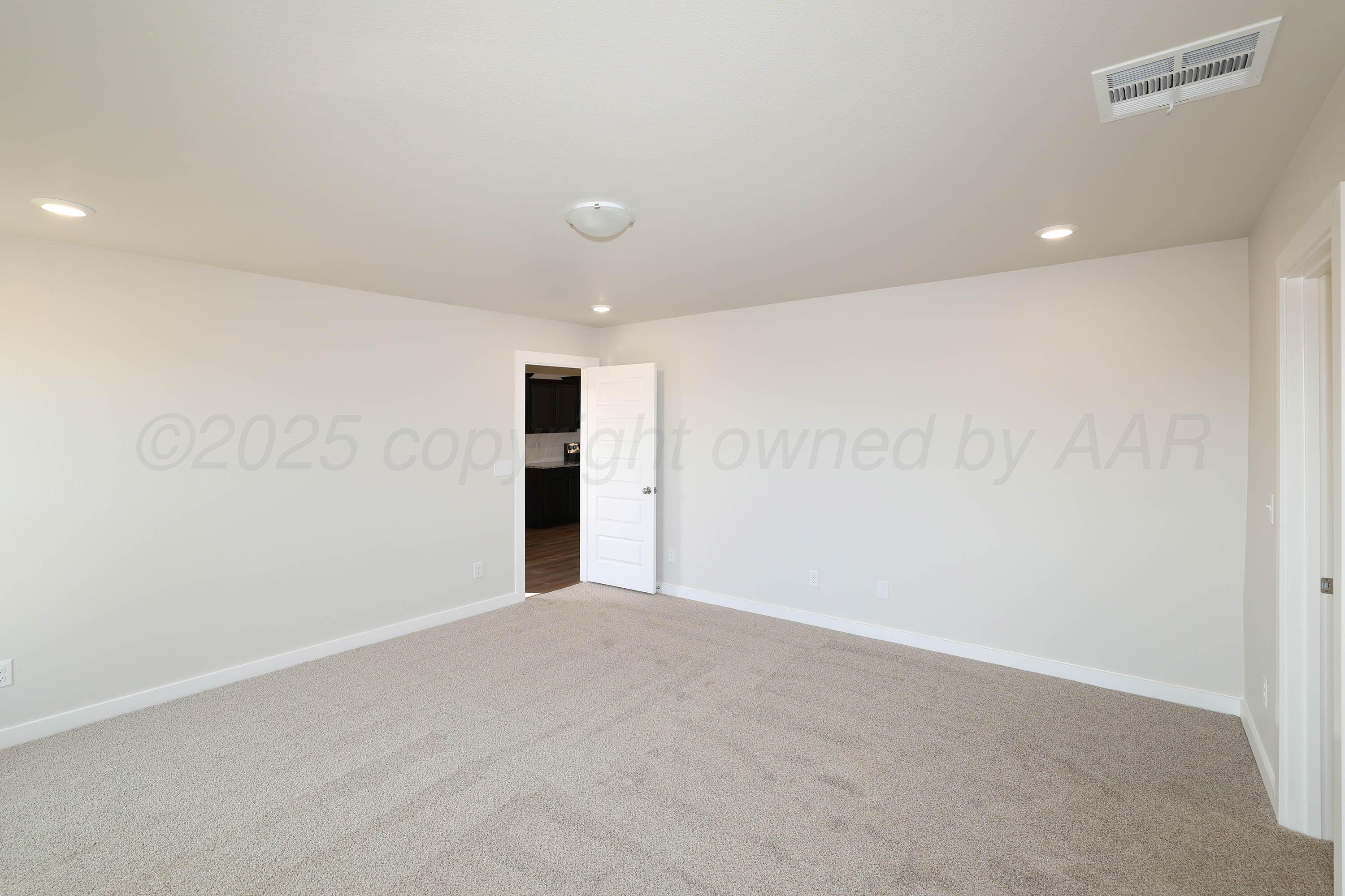3003 Swenson Street Amarillo, TX 79124 - Photo 13 of 23 an empty room with an entryway