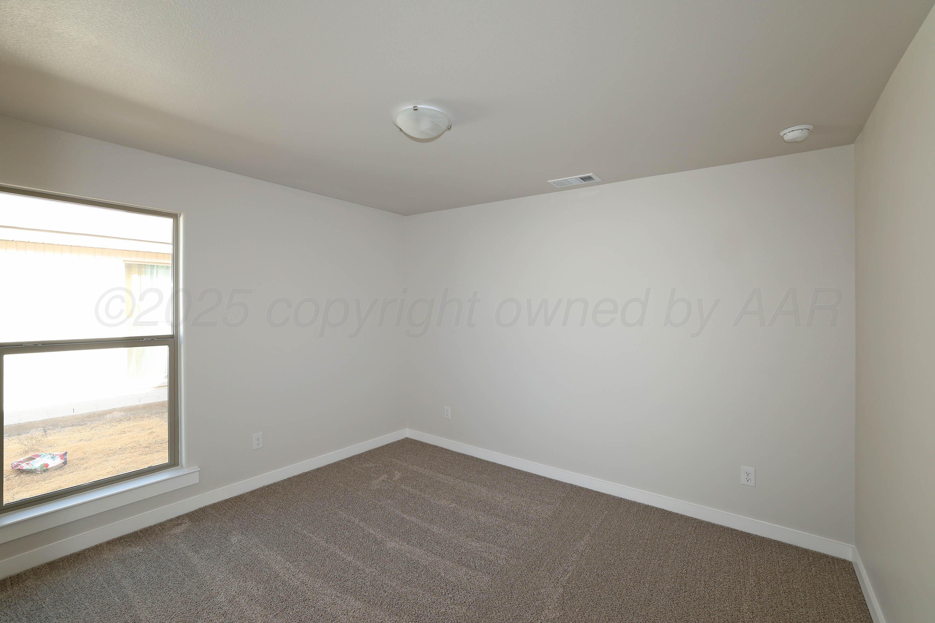 3003 Swenson Street Amarillo, TX 79124 - Photo 19 of 23 an empty room with a window