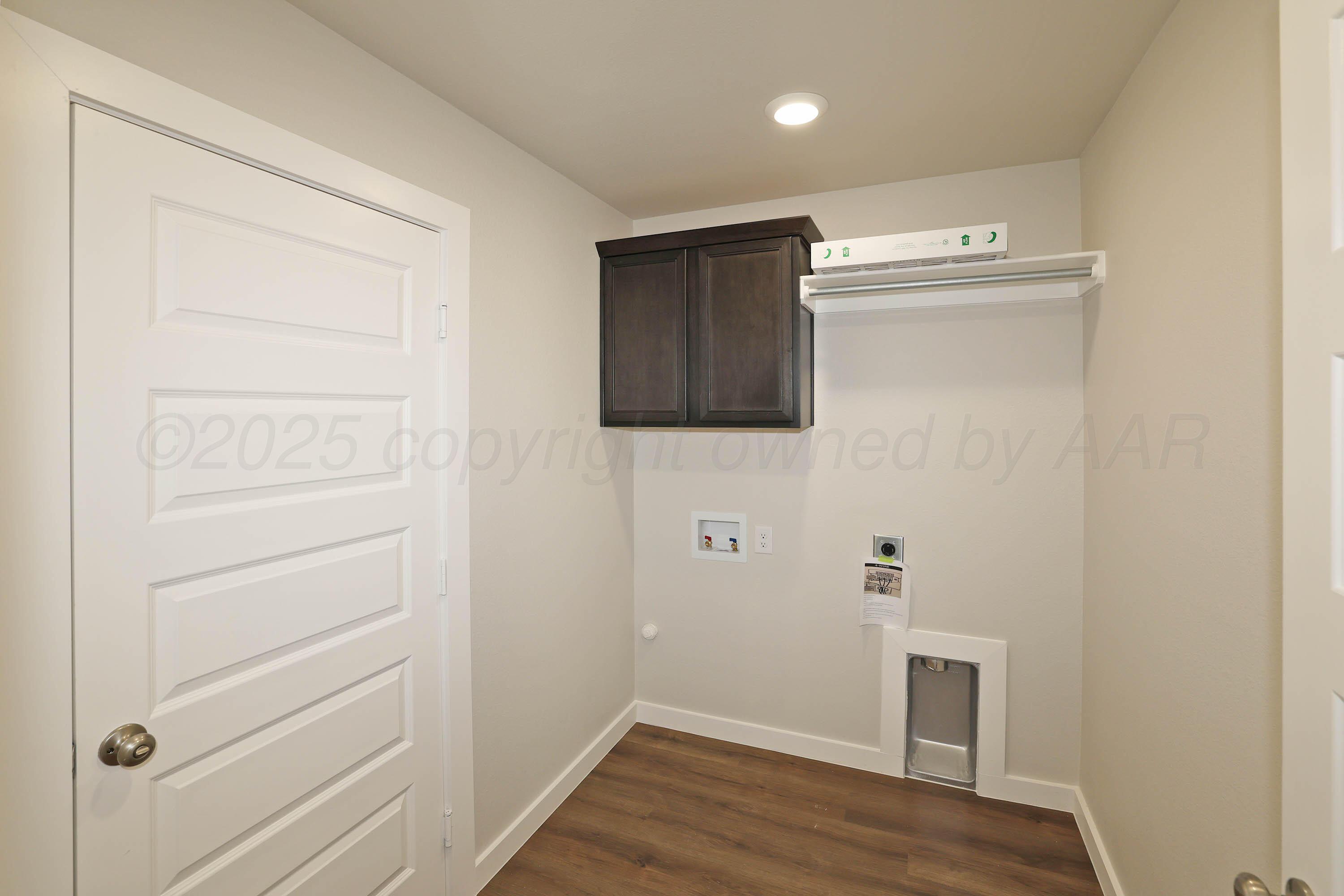 3003 Swenson Street Amarillo, TX 79124 - Photo 22 of 23 a view of empty room with wooden floor
