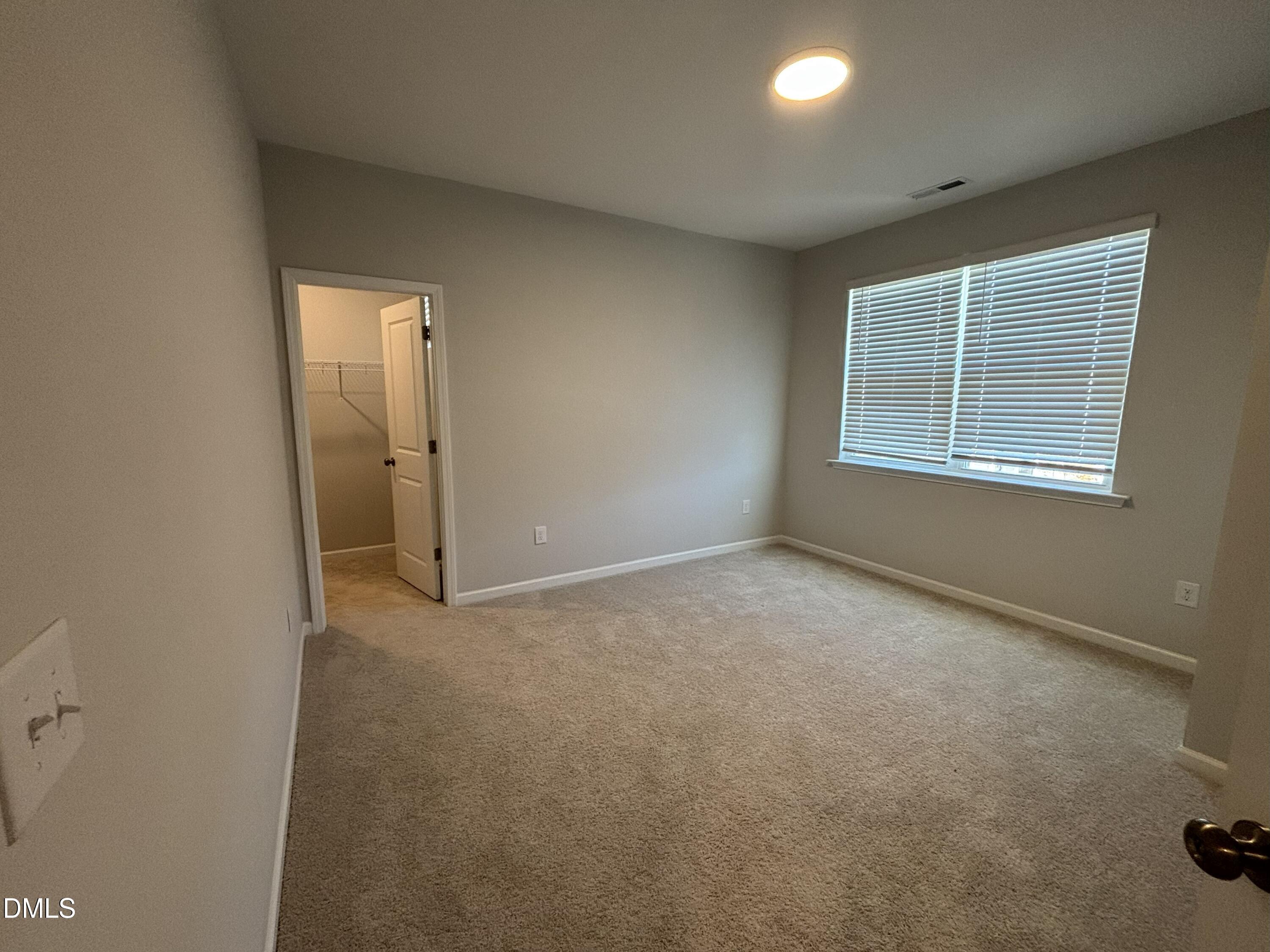 2105 Goudy Drive Raleigh, NC 27615 - Photo 22 of 41 a view of an empty room with a window