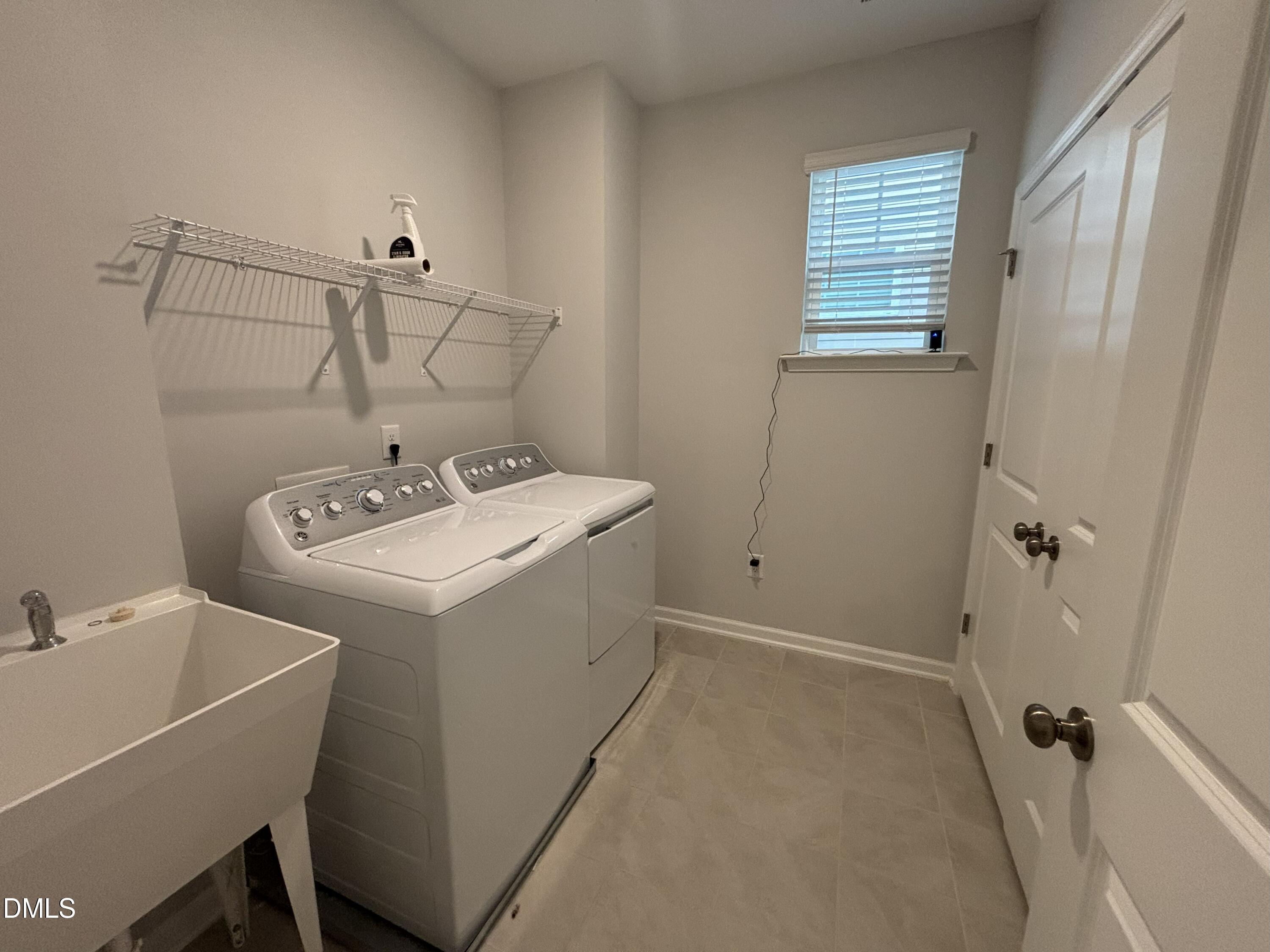 2105 Goudy Drive Raleigh, NC 27615 - Photo 26 of 41 a utility room with a sink dryer and washer