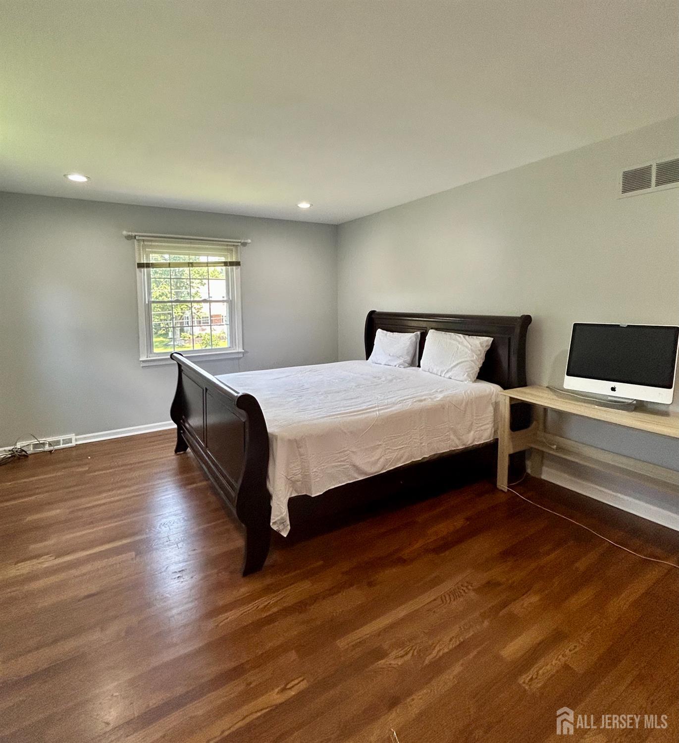 39 Taylor Road Monmouth Junction, NJ 08852 - Photo 14 of 36 a bedroom with a bed and window