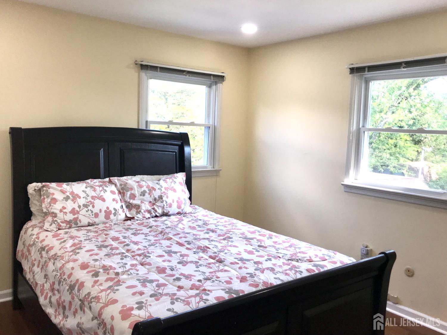 39 Taylor Road Monmouth Junction, NJ 08852 - Photo 17 of 36 a bedroom with a bed and window