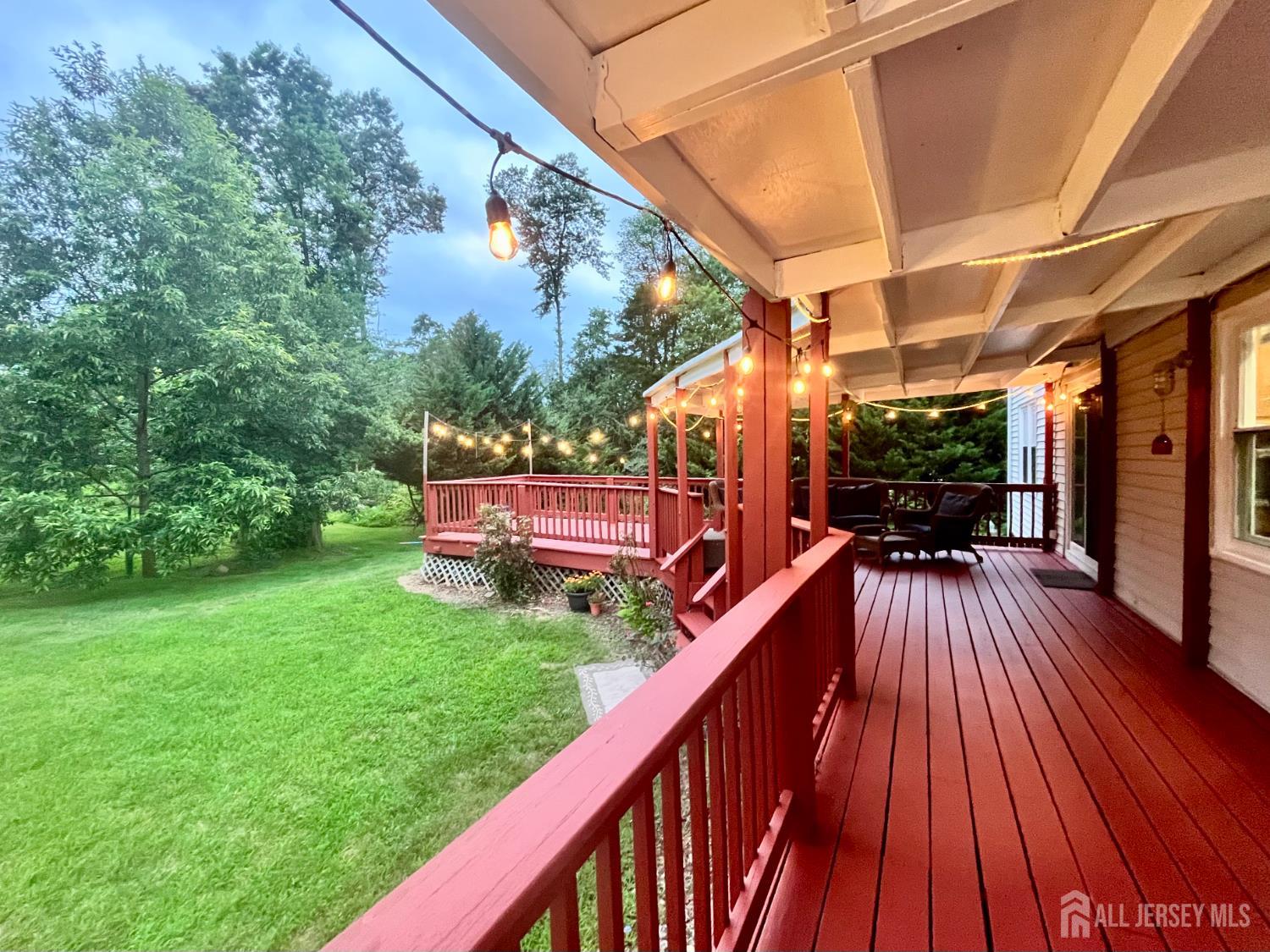 39 Taylor Road Monmouth Junction, NJ 08852 - Photo 33 of 36 a view of deck with wooden floor and outdoor seating