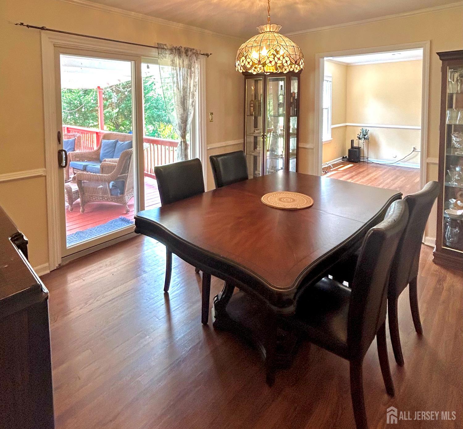 39 Taylor Road Monmouth Junction, NJ 08852 - Photo 7 of 36 a view of a dining room with furniture window and wooden floor