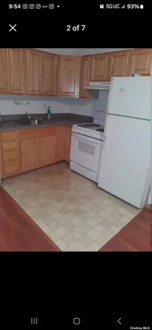 a kitchen with a sink cabinets and stainless steel appliances