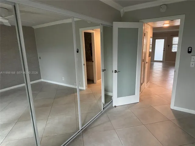 a view of an empty walk in closet