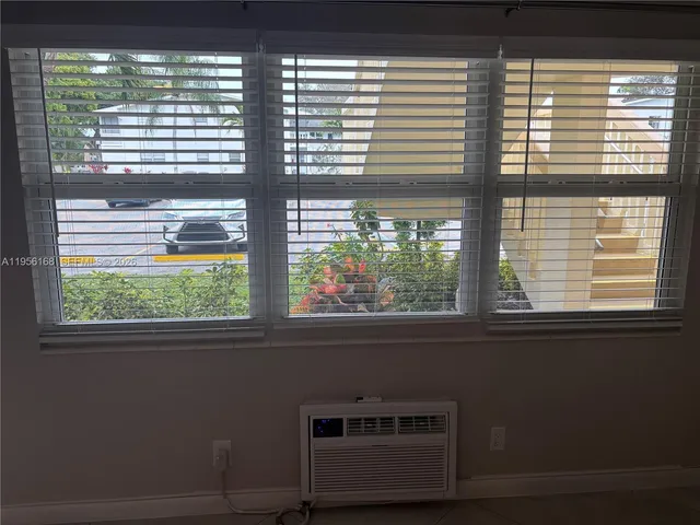 a view of a house that has a windows