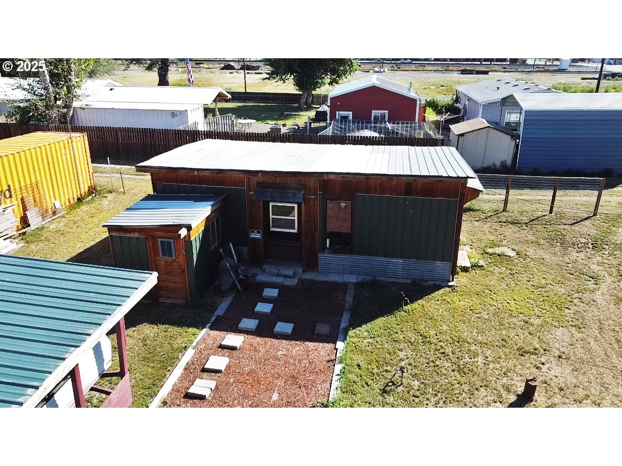 916 Robert Street Haines, OR 97833 - Photo 13 of 18 a terrace of a house with outdoor seating