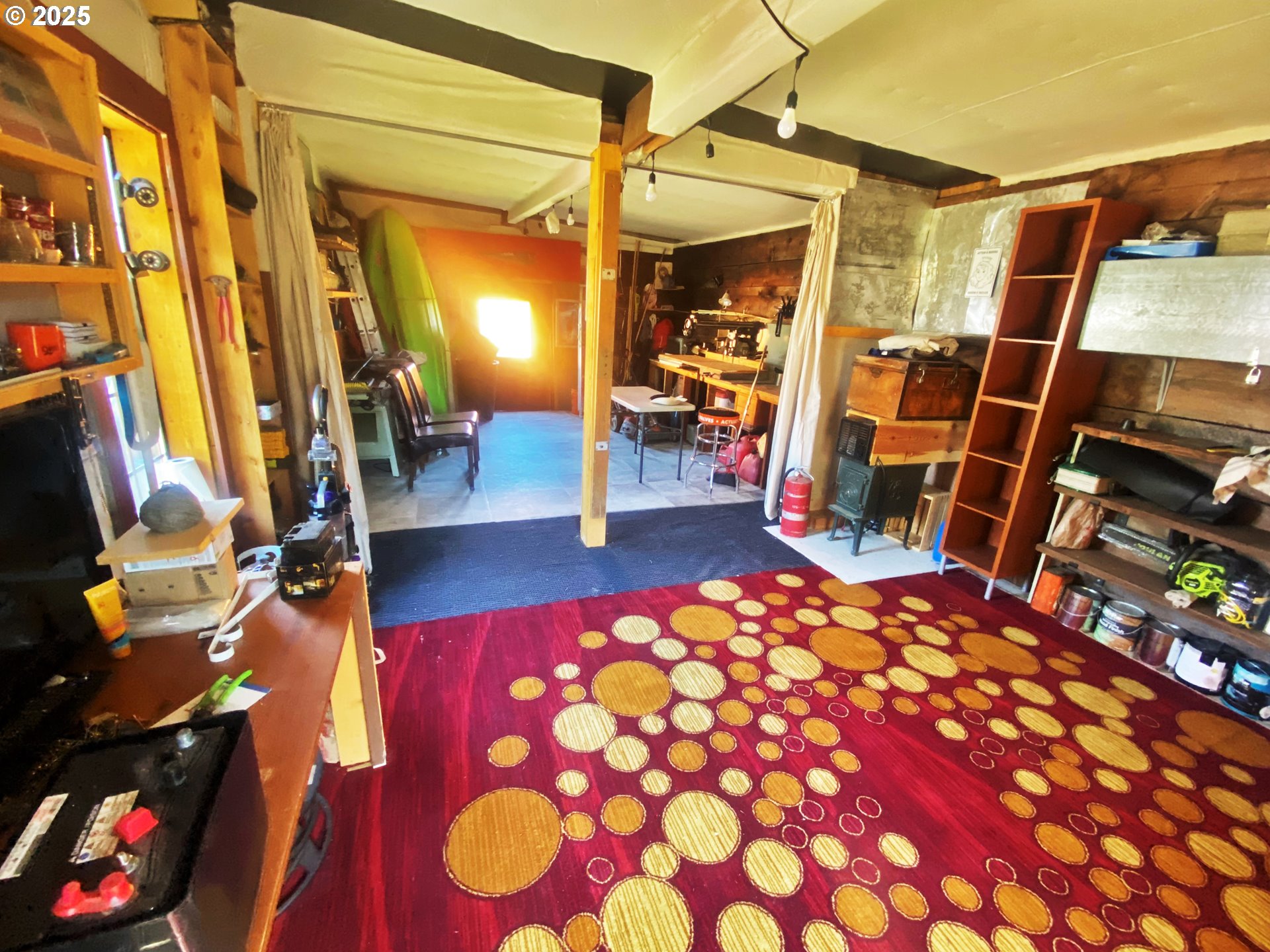 916 Robert Street Haines, OR 97833 - Photo 14 of 18 a backyard of a house with barbeque oven table and chairs