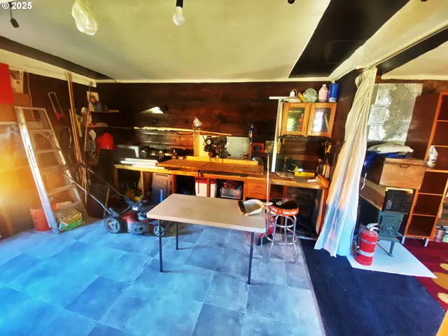 a room with furniture and a flat screen tv