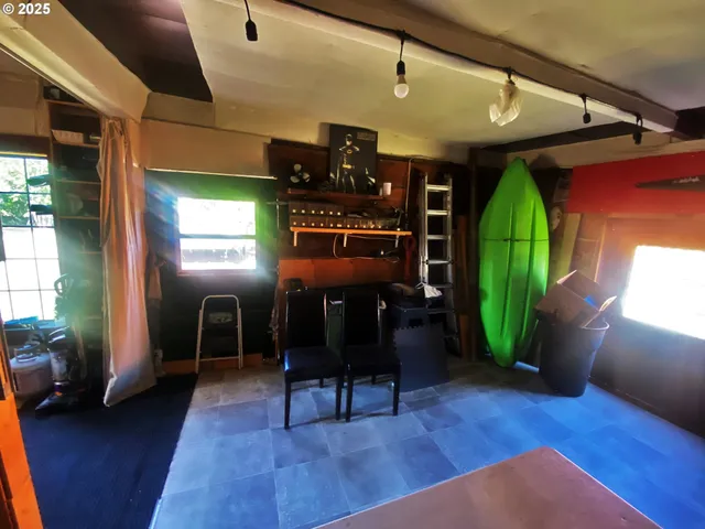 a view of a livingroom with furniture and a hardwood