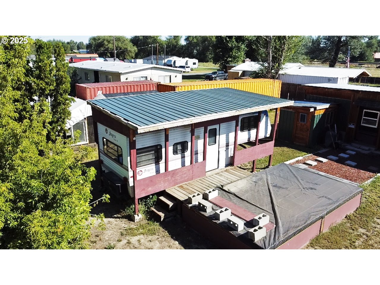 916 Robert Street Haines, OR 97833 - Photo 17 of 18 a terrace with outdoor seating and city view