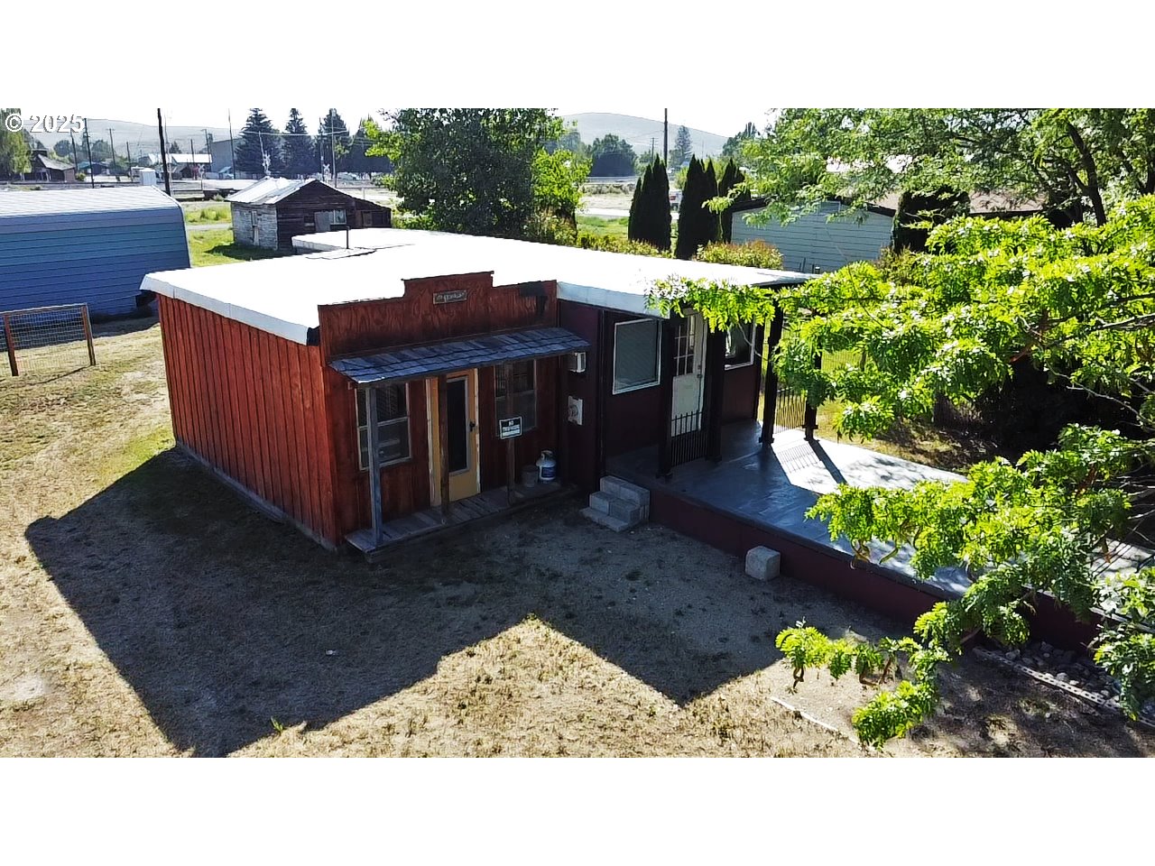 916 Robert Street Haines, OR 97833 - Photo 4 of 18 a view of a backyard with sitting area