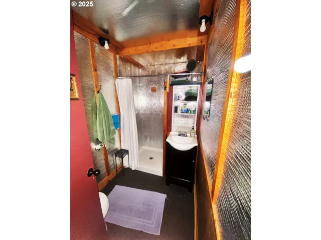 a bathroom with a sink and mirror