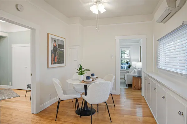 a living room with furniture and a rug