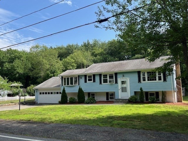 404 Cedar Street Hanover, MA 02339 - Photo 17 of 17 a front view of a house with a garden
