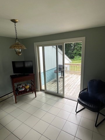 404 Cedar Street Hanover, MA 02339 - Photo 7 of 17 a living room with furniture and a flat screen tv