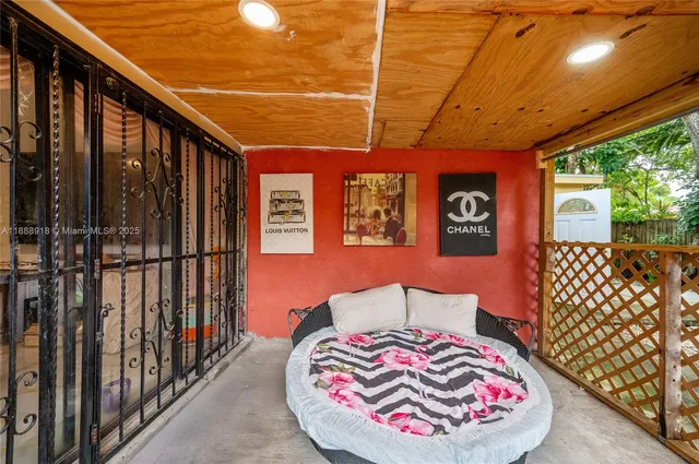 a balcony view with a couple of chairs