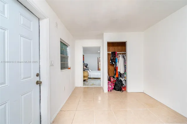 a bed room with a bed and furniture