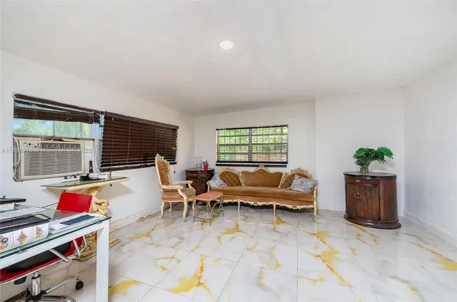 a living room filled with furniture