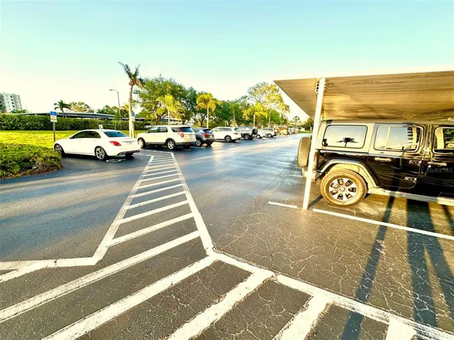 a view of a street with cars
