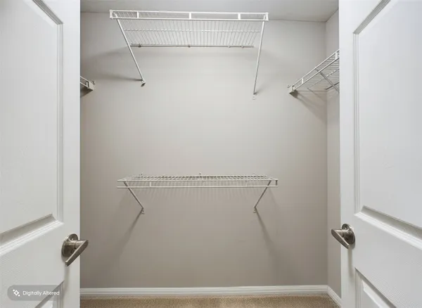 a view of small space with racks on the wall