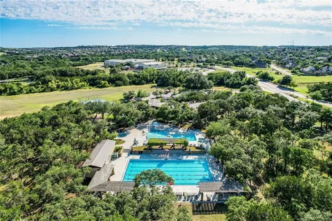 an aerial view of a house with a garden