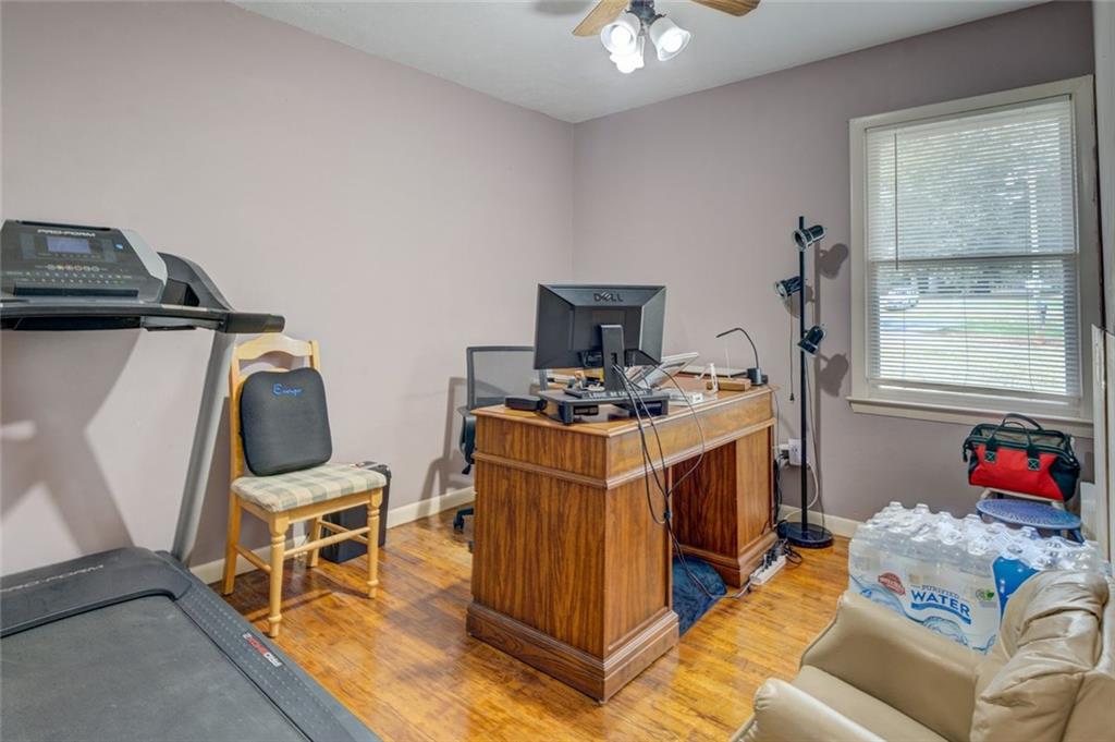 11889 Brown Bridge Road Covington, GA 30016 - Photo 19 of 27 a utility room with cabinets dryer and washer