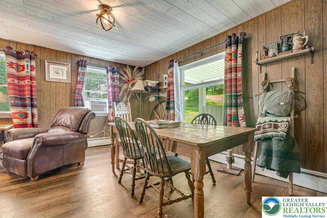 173 Anchorage Road Saylorsburg, PA 18353 - Photo 18 of 75 a view of a livingroom with furniture window and wooden floor