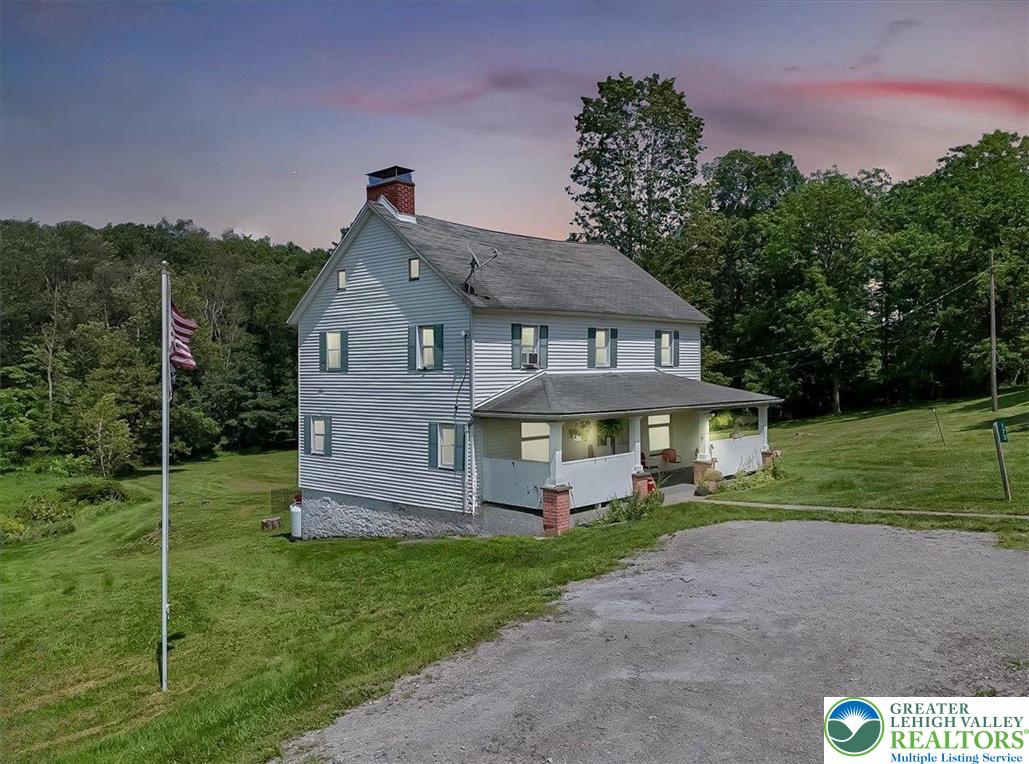 173 Anchorage Road Saylorsburg, PA 18353 - Photo 3 of 75 a front view of a house with a yard